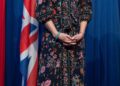 The Duchess of Edinburgh stands and listens during a Women In Leadership reception in Kenya