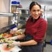 Meghan, in her first solo project as a working royal, championed the charity Hubb Community Kitchen, pictured prepping food there in 2018