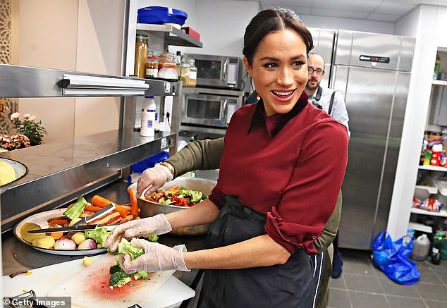 Meghan, in her first solo project as a working royal, championed the charity Hubb Community Kitchen, pictured prepping food there in 2018