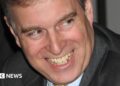 Prince Andrew in close up smiling in a photo from 2020