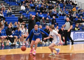 Girls playing basketball.