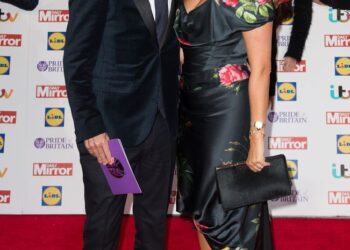 Dan Baldwin with arm around Holly Willoughby