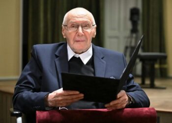 Hungarian composer Gyorgy Kurtag looks on as he holds his 'Doctor Honoris Causa' he received from the University 'Liszt Ferenc Academy of Music' in Budapest in February 2026