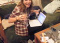 The author celebrating her first story being accepted for publication in 2011 — a year before she decided to move to New York City.