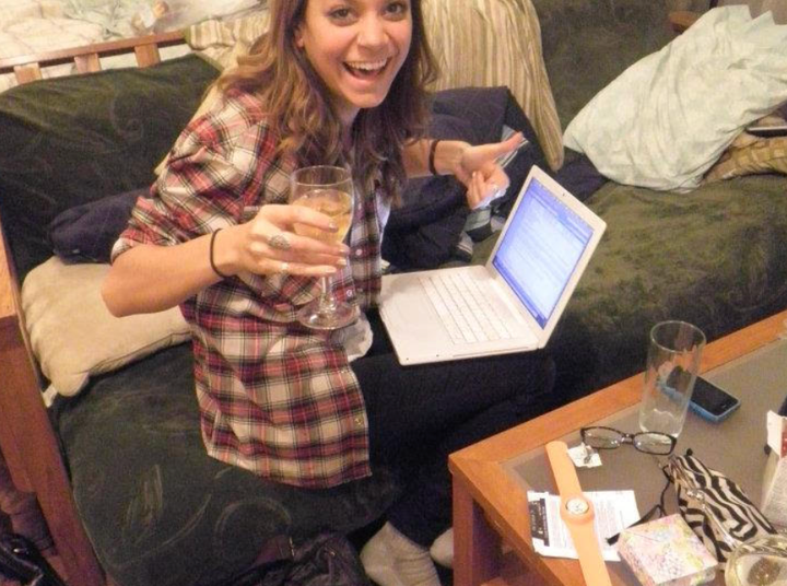The author celebrating her first story being accepted for publication in 2011 — a year before she decided to move to New York City.