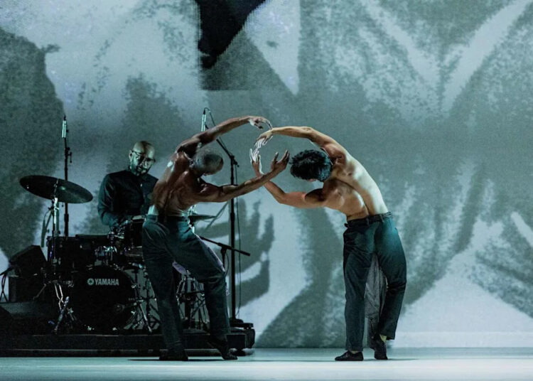 Jamaal Bowman, left, and William Okajima in "The Gettin.'" (Alexander Diaz)