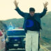 Sensei Sergio dance-walking in front of the cops in One Battle After Another