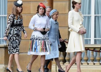 Princess Beatrice and Princess Eugenie follow the Princess of Wales at a Buckingham Palace garden party in 2016