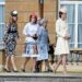 Princess Beatrice and Princess Eugenie follow the Princess of Wales at a Buckingham Palace garden party in 2016