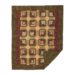 Olive green and maroon patterned quilt