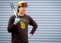 Sung-Mun Song #24 of the San Diego Padres looks on during the first day of spring training workouts at the Peoria Sports Complex on Wednesday, Feb. 11, 2026 in Peoria, Ariz.(Meg McLaughlin / The San Diego Union-Tribune)