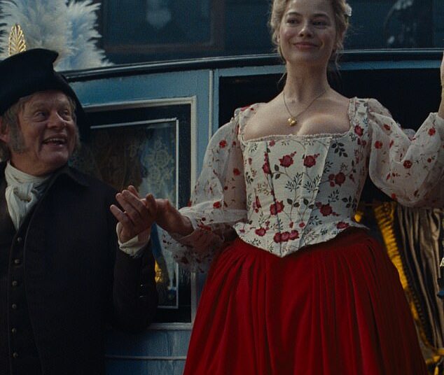Martin Clunes leads the British and Irish TV stars stealing the spotlight from the Hollywood heavyweights in Wuthering Heights (Martin pictured as Mr. Earnshaw with Margot Robbie)