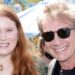 Katherine and Martin Short standing and smiling together in 2021