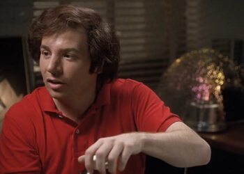 Steve Rubell sitting in his office in 54
