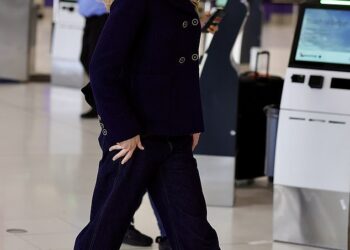 Nicole Kidman looked absolutely radiant on Wednesday as she proudly showed off her naturally curly red hair while jetting out of Sydney Airport