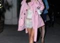 Olivia Rodrigo in a pink coat and tiara.