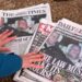 A journalist looks at newspaper front pages on Feb. 20, 2026.
