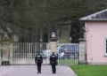 Two police officers outside the Royal Lodge