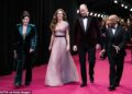 The Prince and Princess had walked the red carpet outside London's Royal Festival Hall, where they were welcomed by Sir Kenneth Olisa, Lord Lieutenant of Greater London (right)