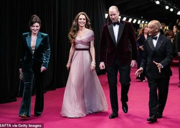 The Prince and Princess had walked the red carpet outside London's Royal Festival Hall, where they were welcomed by Sir Kenneth Olisa, Lord Lieutenant of Greater London (right)