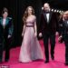 The Prince and Princess had walked the red carpet outside London's Royal Festival Hall, where they were welcomed by Sir Kenneth Olisa, Lord Lieutenant of Greater London (right)