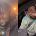 A man leans into a car window, talking to two men inside at night, one of whom is J. Cole. Trees and streetlights are visible in the background.