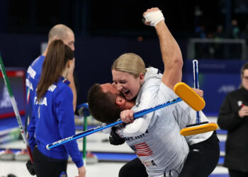 Korey Dropkin and Cory Thiesse of Team USA celebrate winning the Curling Mixed Doubles Semi-final against Amos Mosaner and Stefania Constantini of Italy on Feb. 9, 2026.