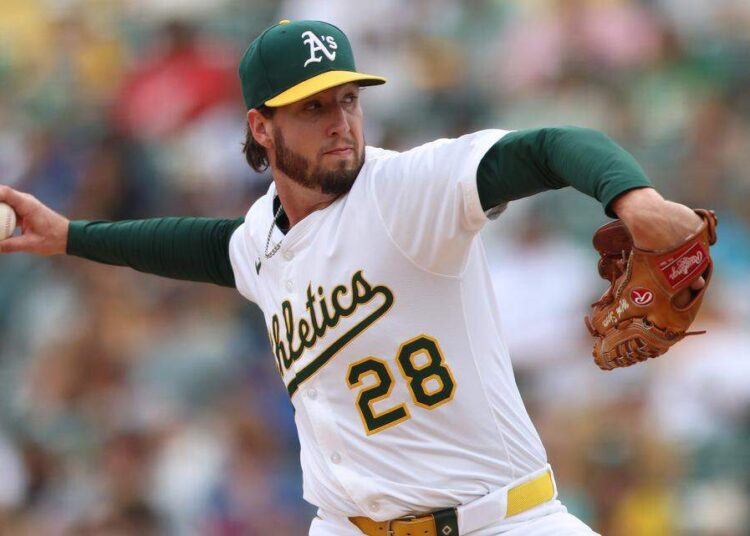 Royals add Mitch Spence from A’s to bolster starting depth