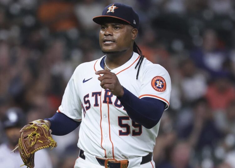 Aug 27, 2025; Houston, Texas, USA; Houston Astros starting pitcher Framber Valdez (59) reacts after a double play during the sixth inning against the Colorado Rockies at Daikin Park. Mandatory Credit: Troy Taormina-Imagn Images