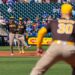 San Diego Padres infielder Mason McCoy (18) throws to first during an MLB Spring Training game between the San Diego Padres and the Kansas City Royals, Saturday February 21, 2026 at Surprise Stadium in Surprise, AZ.
