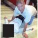 Andrew Mountbatten-Windsor leans over an unidentified woman in an undated photo released by the Department of Justice.