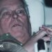 Andrew Mountbatten-Windsor in the back of a car on his release from custody.
