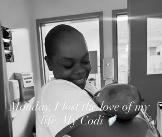 Cori Broadus holding her baby daughter Cori Broadus/Instagram