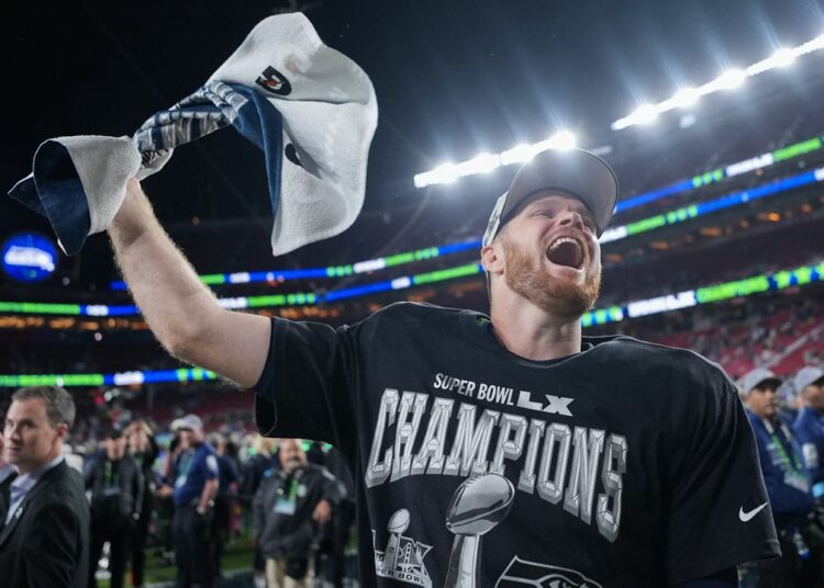 Seattle Seahawks quarterback Sam Darnold celebrates after a win over the New England Patriots in the NFL Super Bowl 60 football game, Sunday, Feb. 8, 2026, in Santa Clara, Calif. (AP Photo/Matt Slocum, file)