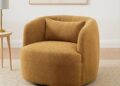 Pale orange boucle arm chair