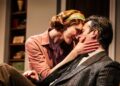 A woman and a man embrace onstage at Geffen Playhouse.