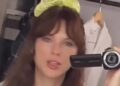 Taylor Swift has revealed she she kept the cheesy dance scenes a secret from Domhnall Gleeson as she shares new BTS extended versions from the Opalite music video with fans