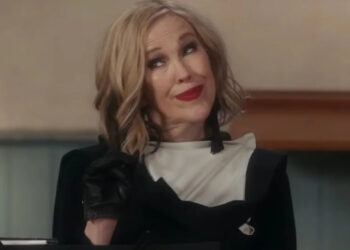 Catherine O'Hara making a gesture as she speaks in Schitt's Creek.