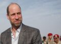 Prince William boards a plane to leave Saudi Arabia. Pic: PA