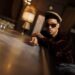 Anderson .Paak stands in his restaurant lounge