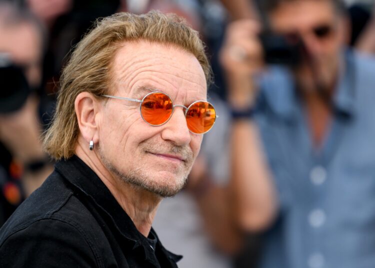 A photo of Bono wearing sunglasses.