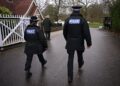 A police officer patrols near the Royal Lodge, Andrew Mountbatten-Windsor's former residence in Windsor Great Park, on Thursday.