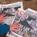 A journalist looks at Friday's newspaper front pages in London after Andrew Mountbatten-Windsor was arrested and held for hours by British police on suspicion of misconduct in public office related to his links to Jeffrey Epstein.
