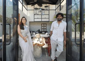Image may contain Vignesh Shivan Nayantara Clothing Dress Formal Wear Evening Dress Fashion Gown Floor and Door