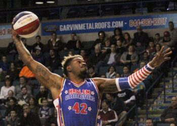 Harlem Globetrotter Spider Sharpless goes for a slam dunk during a game against the Washington Generals at Mohegan Arena in Wilkes-Barre Twp. (FILE)