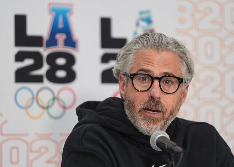 Casey Wasserman, LA28 chairperson and president, takes questions from the media during a news conference in Los Angeles on June 5, 2025. (AP Photo/Damian Dovarganes)