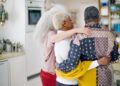 Three sisters hugging