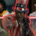 Jackie Chan as Inspector Chan Ka-Kui in Police Story, Jason Lee as Azrael in Dogma, Kurt Russell as Lee Shaw in Monarch: Legacy of Monsters, Dave Bautista as Drax the Destroyer in Guardians of the Galaxy, and Carl Weathers as Apollo Creed in Rocky in a composite image