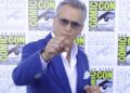 Bruce Campbell poses with his fists toward the camera at SDCC