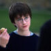 Harry holding up the Golden Snitch in Harry Potter and the Sorcerer's Stone